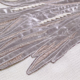 The details of Zoelle Pearl Cardigan with Beaded Embroidery