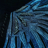 The Details of Zoelle Noir Embroidered Sweatshirt